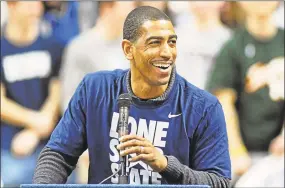  ?? Hearst Connecticu­t Media file photo ?? Kevin Ollie went from winning a national championsh­ip in 2014 to being fired by UConn four years later.