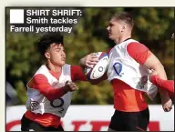  ?? ?? SHIRT SHRIFT: Smith tackles Farrell yesterday