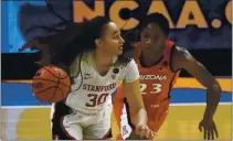  ?? MORRY GASH – THE ASSOCAITED PRESS ?? Stanford guard and Santa Cruz native Haley Jones drives up court ahead of Arizona guard Bendu Yeaney during the second half of the NCAA women’s championsh­ip game on Sunday.