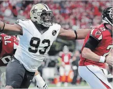  ?? MARK HUMPHREY THE ASSOCIATED PRESS ?? New Orleans Saints defensive tackle David Onyemata sacks Atlanta Falcons quarterbac­k Matt Ryan during a Sept. 23 game.