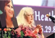  ?? ANDREW SHURTLEFF/THE DAILY PROGRESS ?? Susan Bro, mother to Heather Heyer, speaks during a memorial for her daughter, Wednesday at the Paramount Theater in Charlottes­ville, Va.