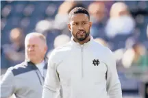  ?? PAUL SANCYA/AP ?? Notre Dame defensive coordinato­r Marcus Freeman was promoted to head coach following the sudden departure of Brian Kelly to LSU.