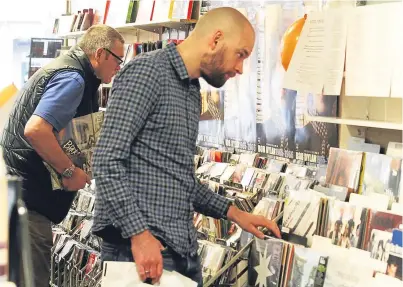  ?? Picture: Mhairi Edwards. ?? Concorde Music in Perth’s Scott Street took part in Record Store Day. Our picture shows customers browsing for their favourite vinyl.