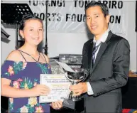  ??  ?? New Coach of the Year Emma Billing, pictured with Japan You from the Tu¯rangi Bakery &amp; Cafe, who presented her award.