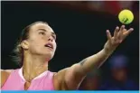  ?? ?? INDIAN WELLS: Aryna Sabalenka serves against Emma Raducanu of Great Britain in their third round match during the BNP Paribas Open at Indian Wells Tennis Garden in Indian Wells, California. — AFP