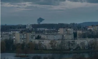  ?? ?? Smoke rises after a missile strike in western Ukraine on Friday. Photograph: Artur Abramiv/Zuma Press Wire/Rex/Shuttersto­ck