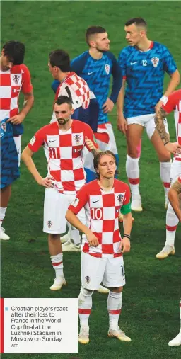  ?? AFP ?? Croatian players react after their loss to France in the World Cup final at the Luzhniki Stadium in Moscow on Sunday.