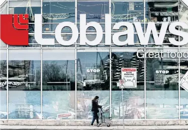  ?? ANDREW FRANCIS WALLACE TORONTO STAR ?? Grocery chains, such as Loblaws, are ramping up pickup and delivery services, encouragin­g customers to limit visits and prioritizi­ng front-line health-care workers amid the pandemic.