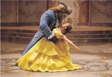  ??  ?? Dan Stevens as the Beast and Emma Watson as Belle star in an updated, live-action version of Beauty and the Beast, opening Friday