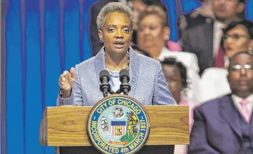  ?? ASHLEE REZIN/SUN-TIMES ?? Mayor Lori Lightfoot declared Monday, “I campaigned on change. You voted for change. And I plan to deliver change to our government.”