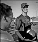  ?? STAFF PHOTO BEN GOFF
@NWABenGoff ?? Tristan Trundle, Pea Ridge tight end/defensive end, shares a laugh with his teammates Monday on the sidelines during the team camp hosted by Gravette in Lions Stadium.