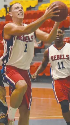  ?? Picture: KATRINA BRIDGEFORD ?? Tim Morris starred for Uni Rebels against Ansett in Darwin League Men action on Friday night