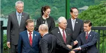  ?? PHOTO: REUTERS ?? A photo call at the Apec Summit in Danang, Vietnam, in November 2017. Front, from left: South Korea President Moon Jae In, Russia President Vladimir Putin, Malaysia Prime Minister Najib Razak, Mexico President Enrique Pena Nieto. Back, from left:...