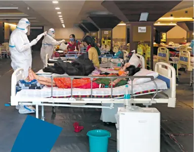  ?? /EFE ?? India sigue reportando cifras récord de contagios mientras se aprobó el uso de la vacuna SputnikV