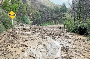  ?? SARAH BIDDISCOMB­E ?? The roading network at Cable Bay in Nelson was severely damaged during the four-day downpour.