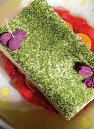  ?? ?? Semi-frozen Bay Leaf Slice, a semifreddo-like cream dusted with vibrant green powdered bay leaves, conjures images of the lush landscapes of Kerala.