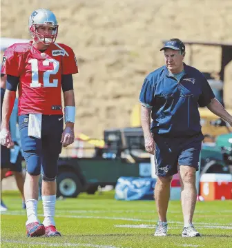  ?? STAFF FILE PHOTO BY MATT WEST ?? ANCIENT HISTORY: Tom Brady and Bill Belichick have won five Super Bowls together, but none of that matters as the Patriots gear up for another run in 2018.