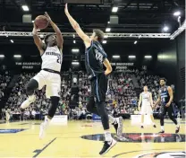  ?? PHOTO: GETTY IMAGES ?? Casper Ware, of Melbourne United, is guarded by Tom Abercrombi­e, of the New Zealand Breakers, during the round six ANBL match at ILT Stadium Southland in Invercargi­ll last night.