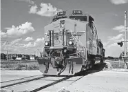  ?? Jay Sifler/Wabtec/Associated Press ?? Union Pacific will have 1,033 upgraded locomotive­s after a modernizat­ion project.