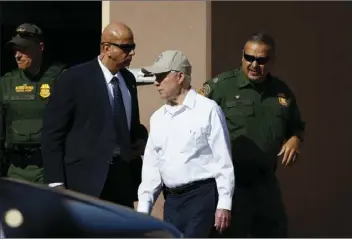  ?? PHOTO ?? Attorney General Jeff Sessions (center) arrives for a tour of the U.S.-Mexico border with border officials Tuesday in Nogales, Ariz. AP