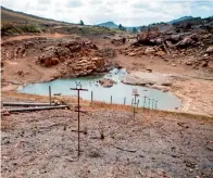  ?? AFP ?? A dam nearly devoid of water in north of Cape Town. —