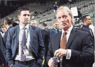  ?? Bruce Bennett / Getty Images ?? Chris Drury and Mike Barnett of the New York Rangers attend the first round of the 2018 NHL Draft at American Airlines Center in Dallas. Drury, a Trumbull native, was promoted to GM and president of the Rangers on Wednesday.