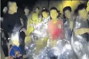  ?? AP FILE ?? A Thai Navy SEAL took images of the 12 boys inside the cave, where they would be trapped more than two weeks.