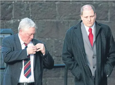  ??  ?? James McCullie, left, and son Stuart arrive at Perth Sheriff Court.