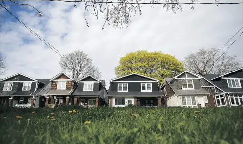  ?? COLE BURSTON / BLOOMBERG NEWS ?? By the estimates of Toronto appraiser Claudio Polito, prices in the Greater Toronto Area have dropped anywhere from five per cent to 15 per cent over the last 30 days.