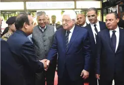  ??  ?? NEW DELHI: Palestinia­n President Mahmoud Abbas, right, is met by officials at the start of a visit to the Centre for Developmen­t of Advanced Computing in Noida, on the outskirts of the Indian capital New Delhi.—AFP