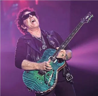  ?? ETHAN MILLER/GETTY IMAGES ?? Neal Schon of Journey performs on May 3, 2017, in Las Vegas.