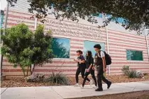  ?? Robin Jerstad/contributo­r file photo ?? Students of Frank Madla Early College High School head to the Ozuna Library at Palo Alto College on the South Side.