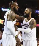  ?? (Reuters) ?? CLEVELAND CAVALIERS guard Kyrie Irving’s (right) current bid for a trade may leave an irreparabl­e rift between him and superstar LeBron James (left).
