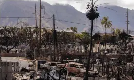  ?? August. Photograph: Yuki Iwamura/AFP/Getty Images ?? Destroyed buildings and cars are seen in the aftermath of the Maui wildfires in Lahaina, Hawaii, on 16