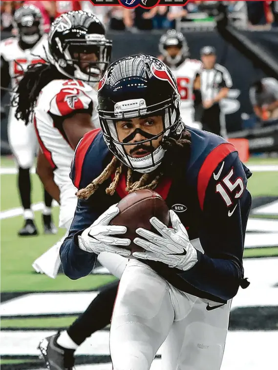  ?? Brett Coomer / Staff photograph­er ?? Texans receiver Will Fuller catches one of his three TD passes from Deshaun Watson on Sunday. Fuller finished with a career-best 14 receptions for 217 yards.
