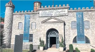  ?? BRUCE SCHREINER PHOTOS THE ASSOCIATED PRESS ?? The Old Taylor distillery’s towering limestone castle underwent a massive rehabilita­tion after decades of neglect and was renamed Castle &amp; Key Distillery, in Millville, Ky.