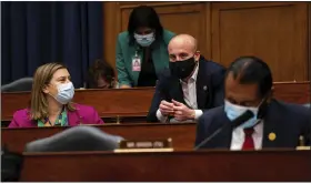  ?? (AP/The New York Times/Anna Moneymaker) ?? Representa­tives Elissa Slotkin, D-Mich., and Max Rose, D-N.Y., speak before a House Committee on Homeland Security meeting in July 2020 on Capitol Hill in Washington regarding the national response to the coronaviru­s pandemic.