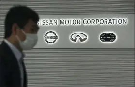  ?? KOJI SASAHARA — THE ASSOCIATED PRESS ?? Nissan faces its first annual loss in 11years. The Japanese automaker finished its fiscal year in March with a $6.3billion loss.