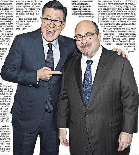  ?? Photo / Getty Images ?? Craig Newmark (right), pictured with TV host Stephen Colbert, gave away $214m last year to support journalism and media initiative­s.