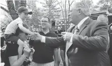  ?? PATRICK DOYLE/THE CANADIAN PRESS ?? Ontario Progressiv­e Conservati­ve Leader Doug Ford attends a rally at Alice’s Village Cafe in Carp.