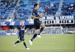  ?? JOSIE LEPE — STAFF ?? Midfielder Shea Salinas celebrates after scoring in the first half against the Sounders, helping the Earthquake­s win the U.S. Open Cup match.