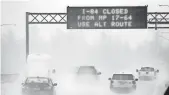  ?? DON RYAN, AP ?? A sign alerts drivers on Interstate 84 in Troutdale, Ore., of road closures last month.