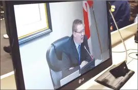  ?? Herald file photo ?? Penticton Mayor Andrew Jakubeit is seen on a video screen in council chambers during a recent meeting.