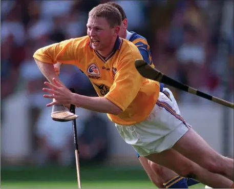  ??  ?? Damien Fitzhenry, Wexford goalkeeper. Pic: Ray McManus /SPORTSFILE. INSET: Clare captain Anthony Daly lifts the Liam MacCarthy Cup after Clare’s 0-20 to 2-13 win over Tipperary on September 14th 1997 in Croke Park. Pic: Matt Browne/SPORTSFILE.