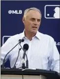  ?? WILFREDO LEE — THE ASSOCIATED PRESS ?? Major League Baseball Commission­er Rob Manfred speaks during a news conference after negotiatio­ns with the players' associatio­n toward a labor deal, March 1 in Jupiter, Florida.