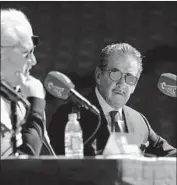  ?? Gary Coronado Los Angeles Times ?? ANGELS OWNER Arte Moreno, right, shown with manager Joe Maddon, feuded with agent Scott Boras.