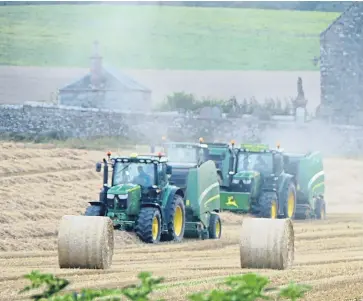  ??  ?? Bringing in the harvest across Fife, Perthshire and Angus.