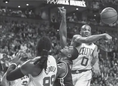  ?? Photo by Jonathan Newton / The Washington Post ?? The last time Avery Bradley (0) and the Celtics faced the reigning NBA champion Cleveland Cavaliers in the playoffs, LeBron James and the Cavs won in four games. The two teams start the Eastern Conference finals Wednesday in Boston.