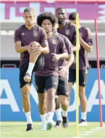  ?? — AFP ?? (L to R) Germany’s defender Thilo Kehrer, forward Serge Gnabry, midfielder Ilkay Gundogan, defender Antonio Ruediger and midfielder Jamal Musiala attend a training session at the Al Shamal Stadium in Al Shamal, north of Doha, on the eve of their Qatar 2022 World Cup match between Germany and Japan.