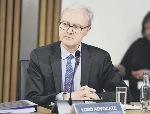  ??  ?? 0 Lord Advocate James Wolffe gives evidence to a committee examining the handling of harassment allegation­s against Alex Salmond